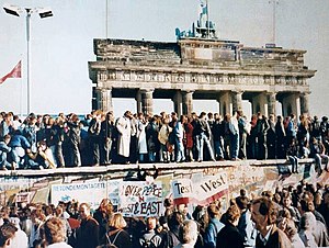 300px-West_and_East_Germans_at_the_Brandenburg_Gate_in_1989.jpg