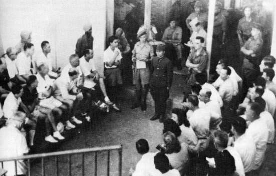 japanese-soldier-confronted-by-french-civilians_1945